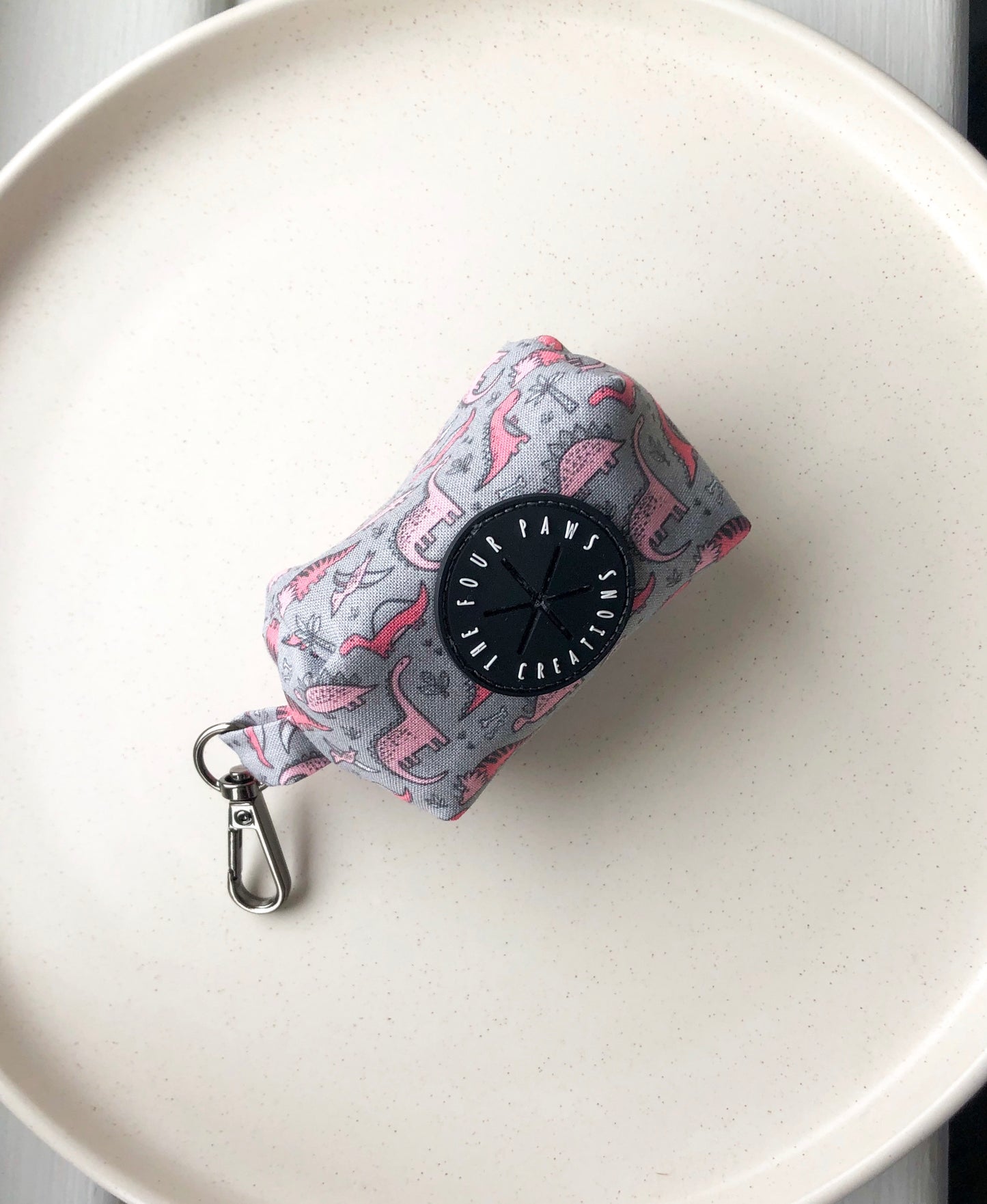 Pink tiny Dinos on grey Poo bag holder