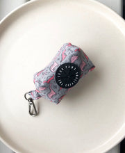 Load image into Gallery viewer, Pink tiny Dinos on grey Poo bag holder